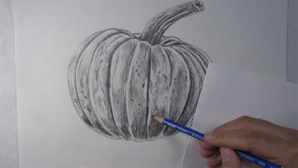 draw spots on the pumpkin