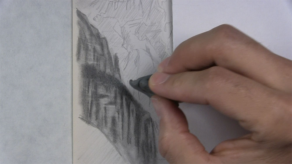 use a kneaded eraser to create strata on a mountain